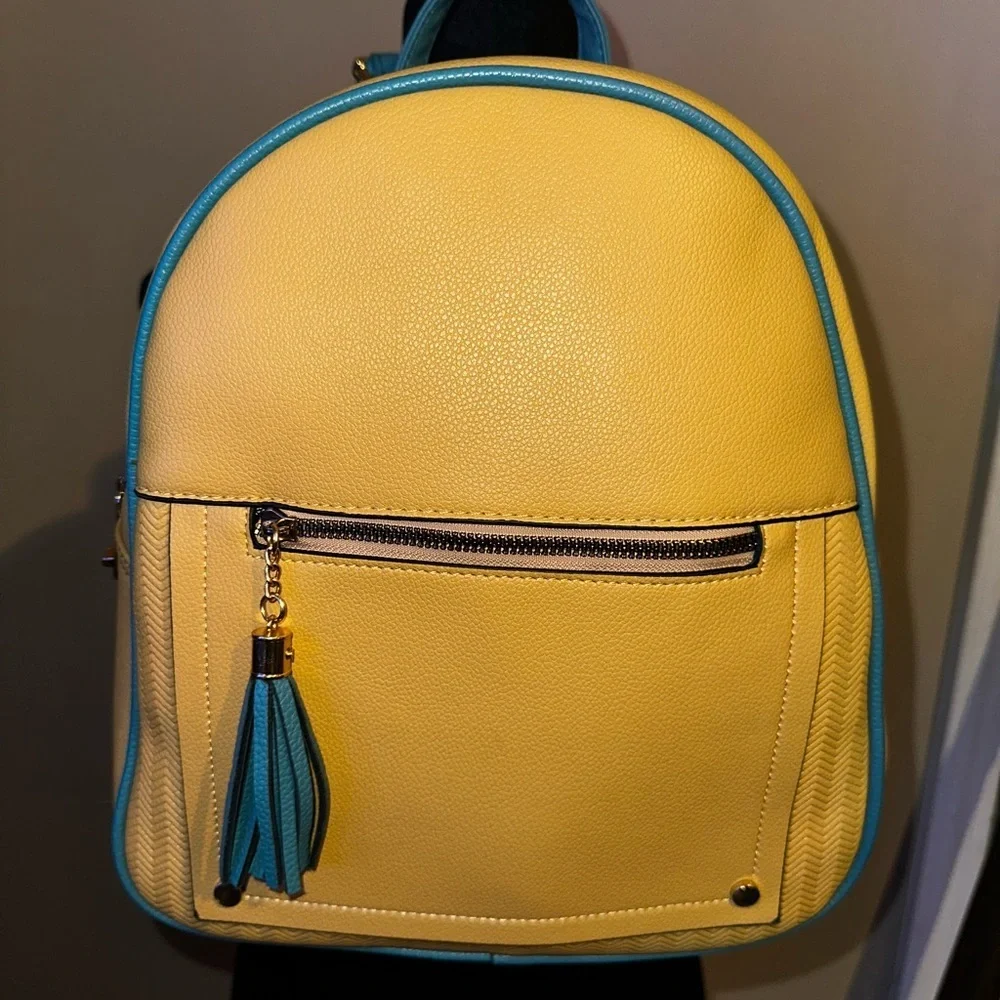 UEC MONTANA WEST Backpack Purse Anti-Theft Backpack with secured zipper & tassel